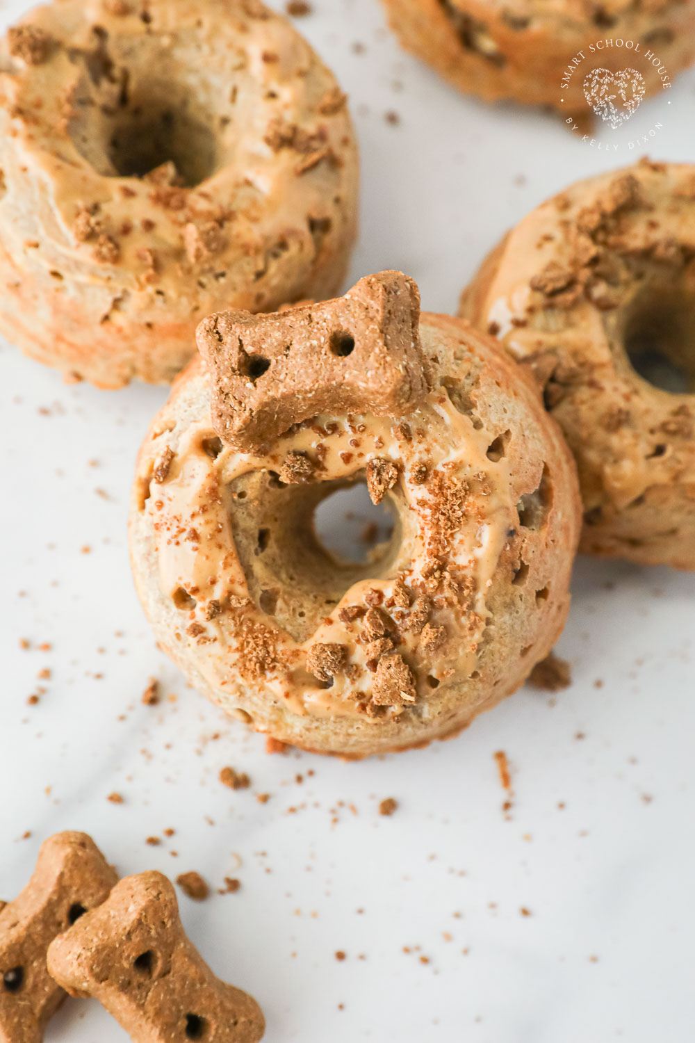 Just for your furry friend, these scrumptious Peanut Butter Dog Donuts are sure to make some tails wag with excitement!