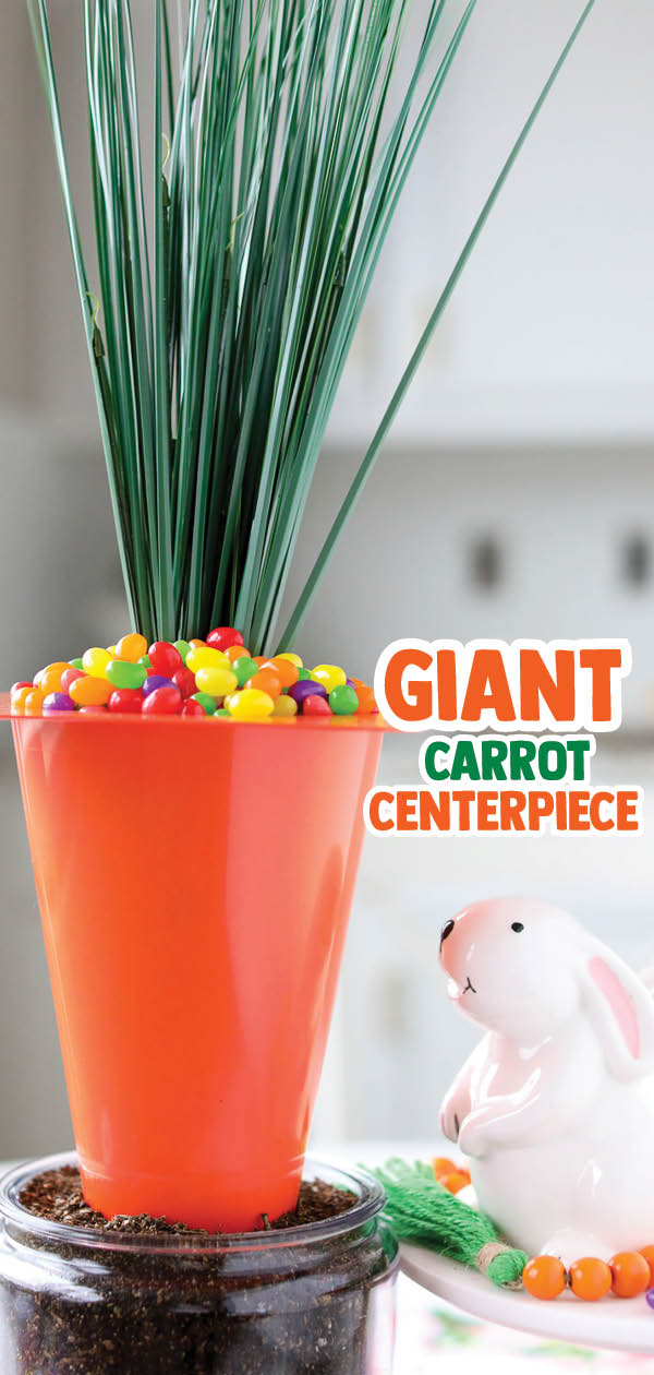 Use an orange playground cone to make a Giant Carrot Centerpiece for Easter! This dollar store centerpiece is filled with Jelly Beans!