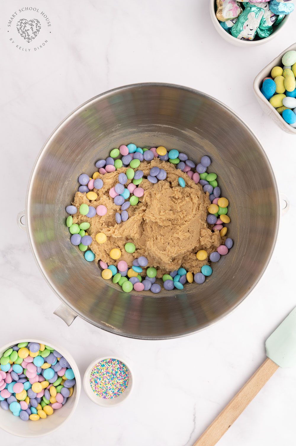 Add M&Ms to the cookie dough
