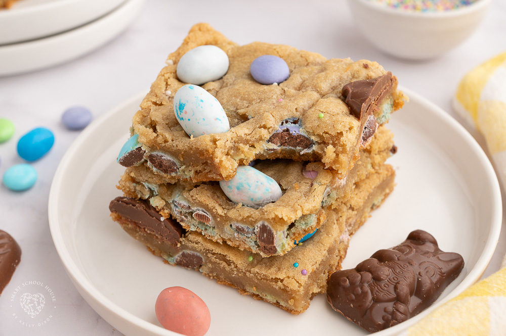 These Easter Cookie Bars are made with a delicious cookie batter, M&M’s, and topped with chocolate bunnies! If you're looking for an Easter dessert recipe, try this adorable treat!