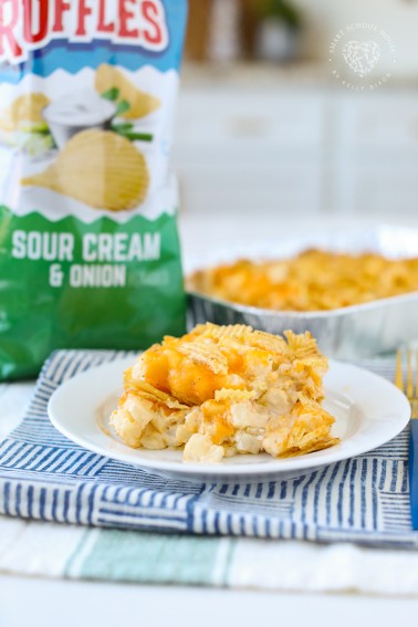 Sour Cream and Onion Party Potatoes! Sour Cream and Onion chips combined with diced hash browns in a cheesy French onion cream sauce.