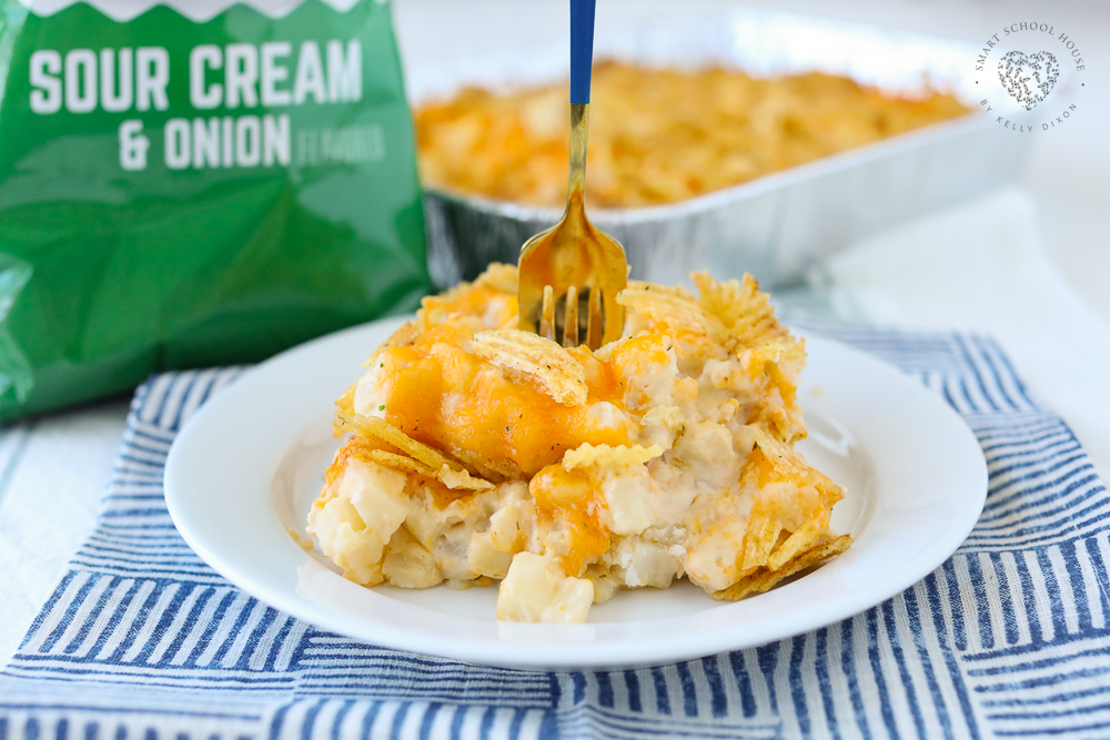Sour Cream and Onion Party Potatoes! Sour Cream and Onion chips combined with diced hash browns in a cheesy French onion cream sauce.