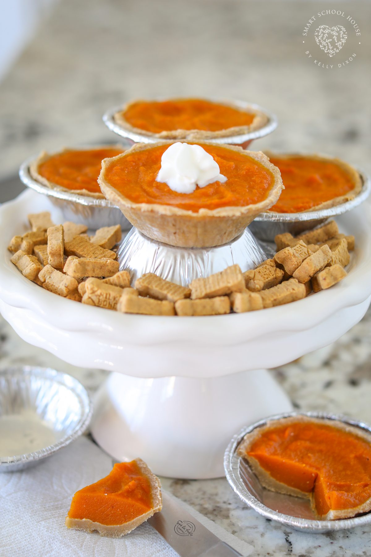 Spoil your pup this fall with the cutest Pumpkin Pies for Dogs! Made with real pumpkin, applesauce, and wheat flour, these mini pies are healthy, easy, and adorable. Perfect for Thanksgiving, Halloween, or anytime you want to bake a homemade dog treat!