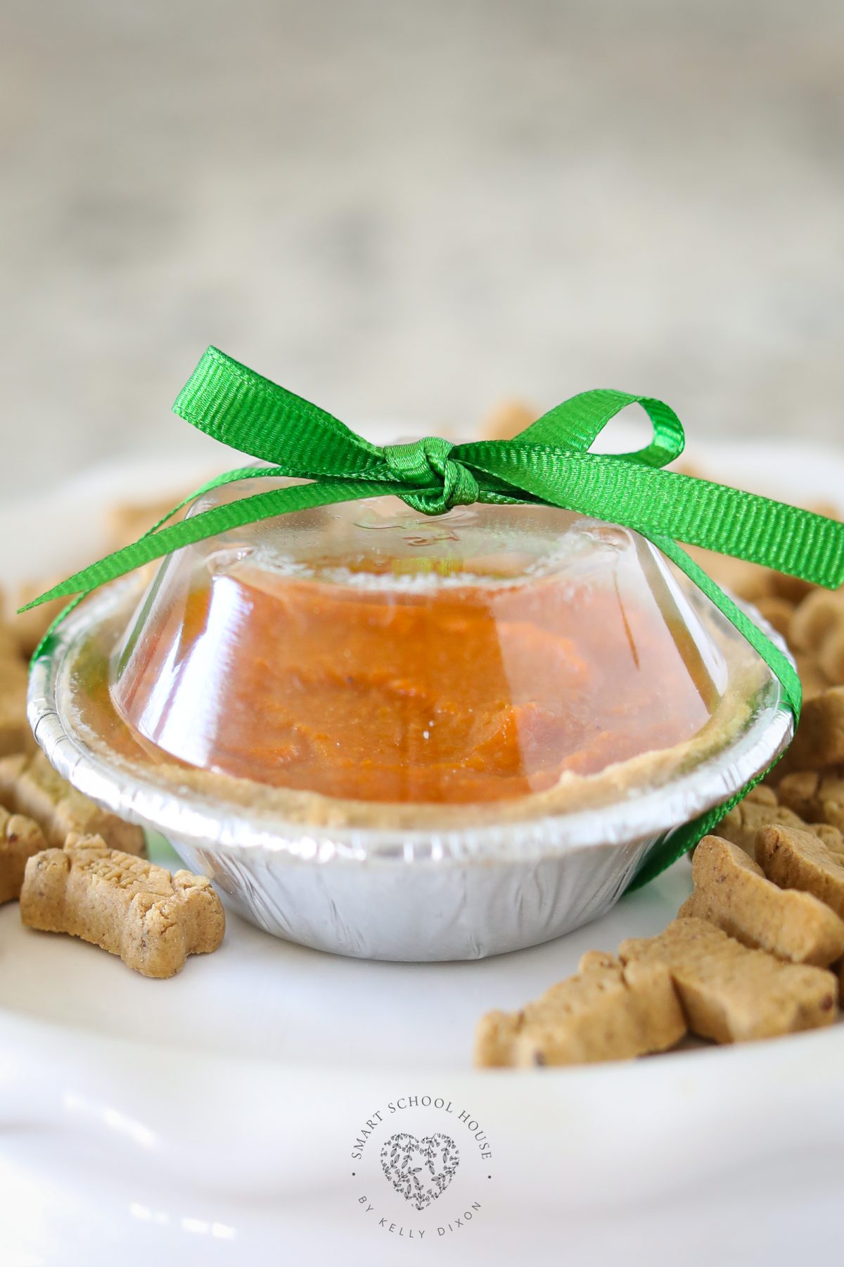 Make adorable homemade Pumpkin Pies for Dogs! This easy 5-ingredient recipe uses real pumpkin, applesauce, and wheat flour for a healthy fall-inspired dog treat your pup will love.