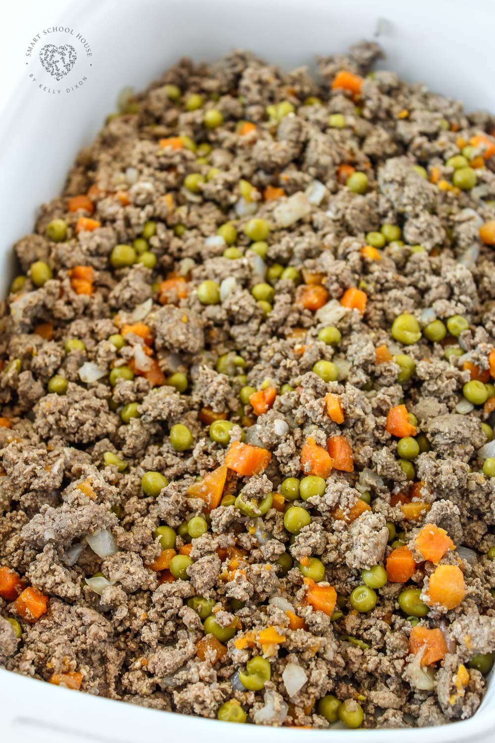 Savory ground beef cooked with vegetables and topped with fluffy mashed potatoes, then baked until golden. A comforting classic with simple ingredients.