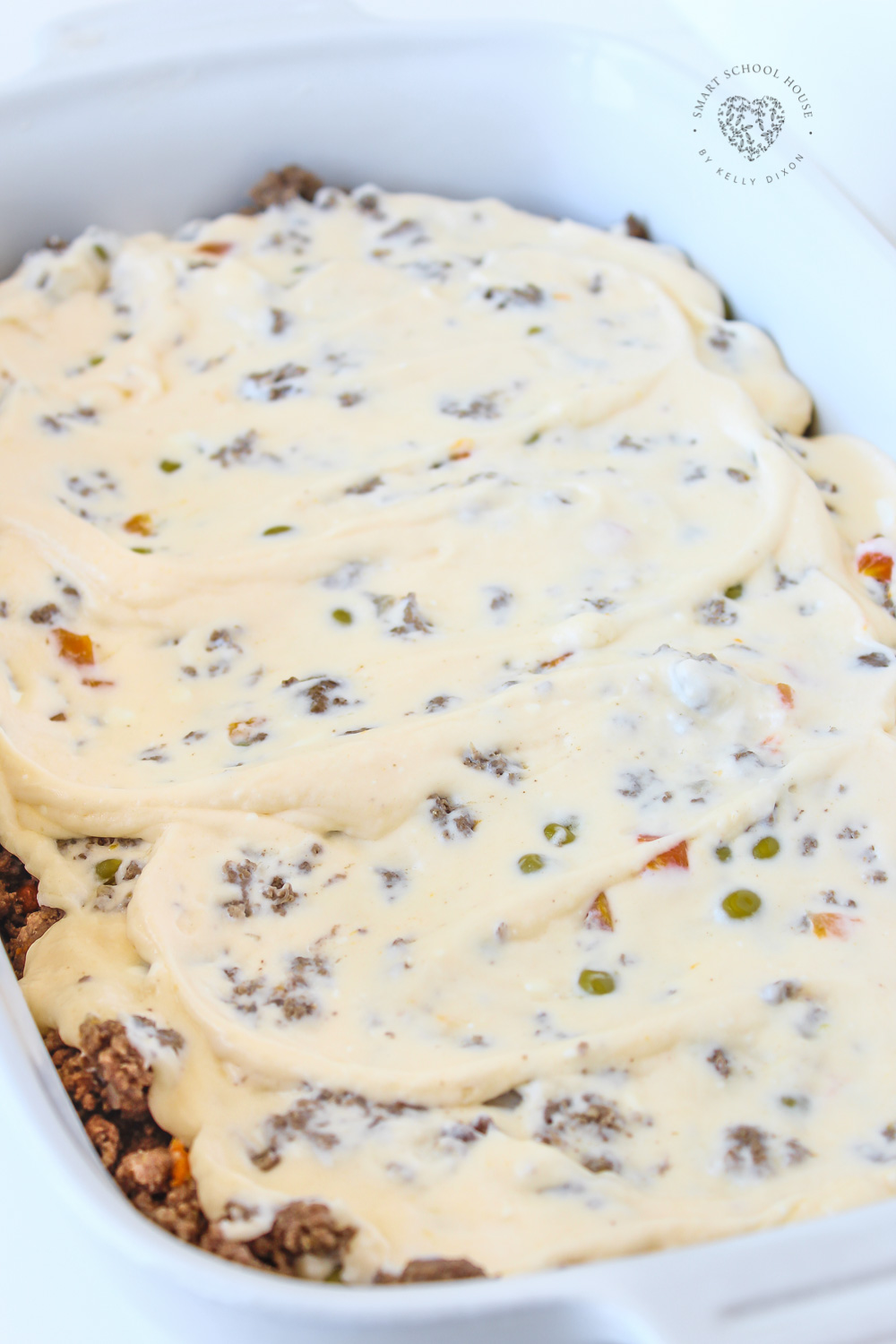 Savory ground beef cooked with vegetables and topped with fluffy mashed potatoes, then baked until golden. A comforting classic with simple ingredients.