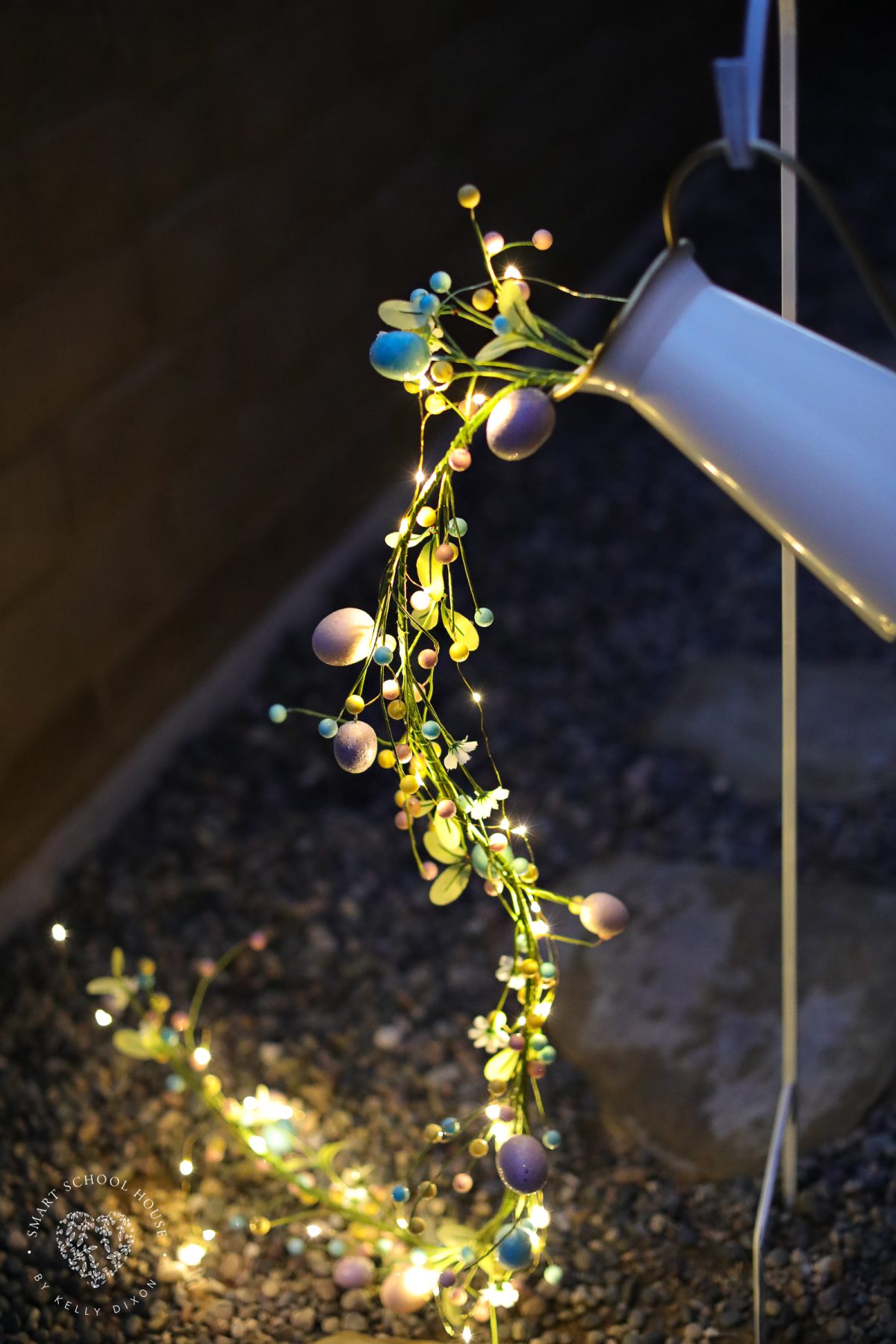 This Pouring Easter Garland is a stunning spring decor idea that looks like glowing Easter eggs spilling from a pitcher. A creative DIY Easter craft for adults that’s perfect for porches, gardens, and walkways.