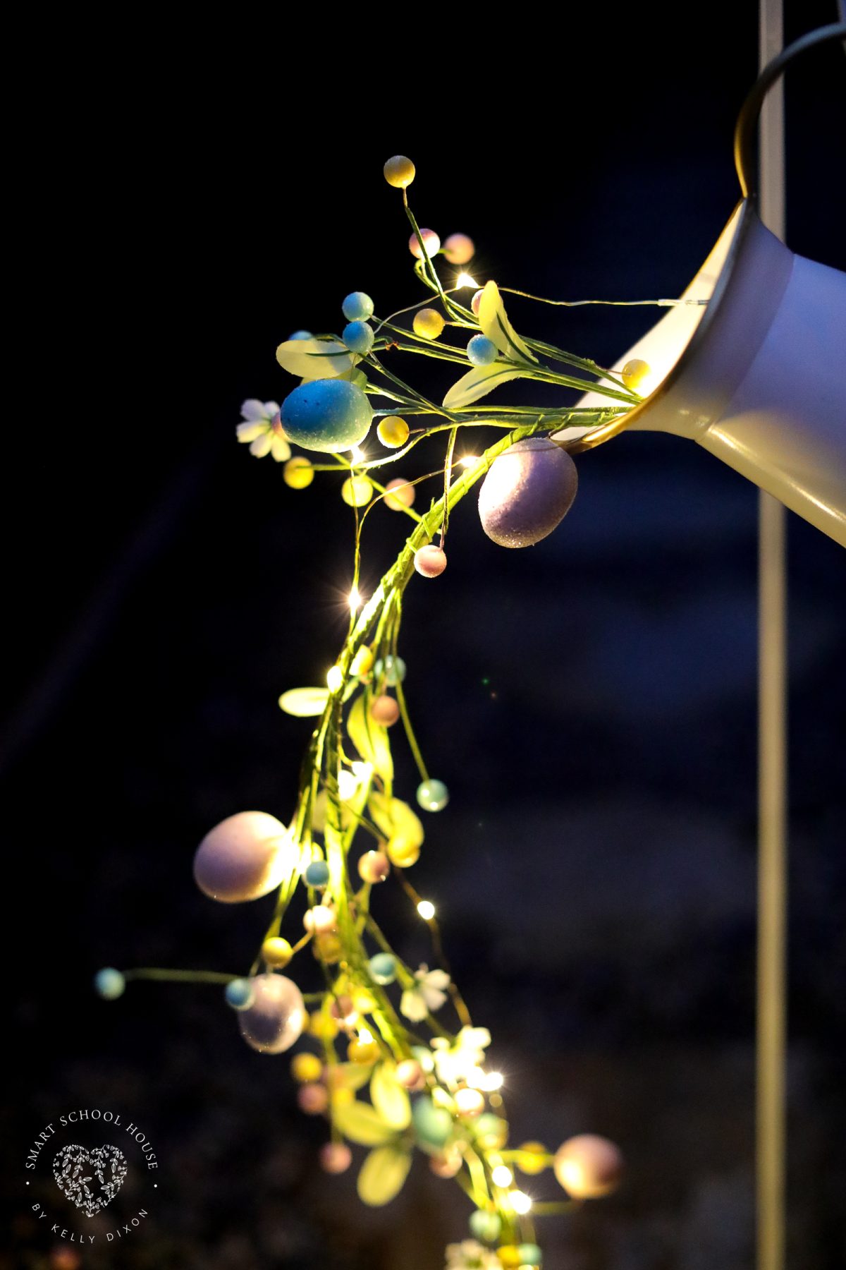 This Pouring Easter Garland is a stunning spring decor idea that looks like glowing Easter eggs spilling from a pitcher. A creative DIY Easter craft for adults that’s perfect for porches, gardens, and walkways.