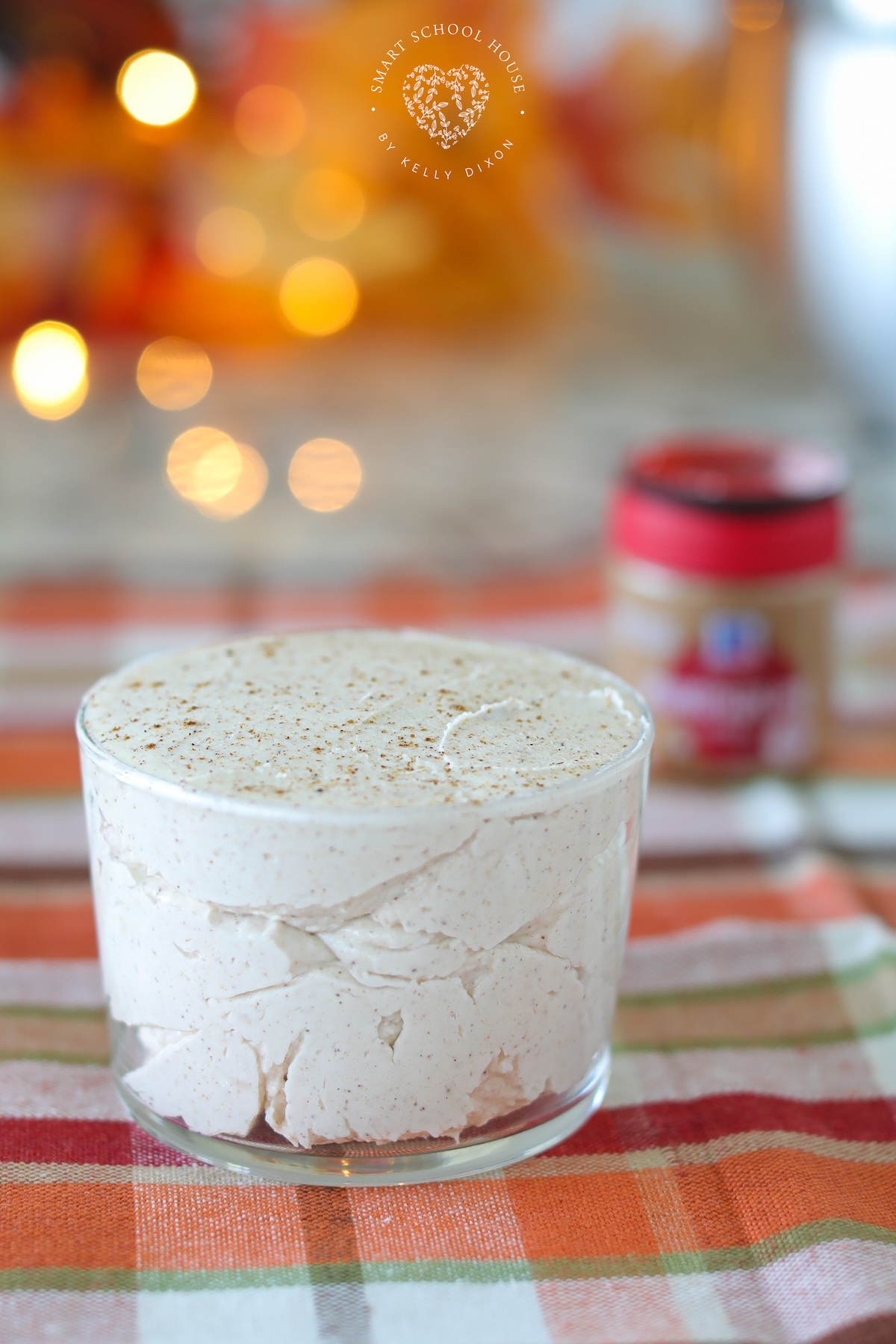 This easy Pumpkin Spice Buttercream Frosting is creamy, fluffy, and made with only four ingredients!
