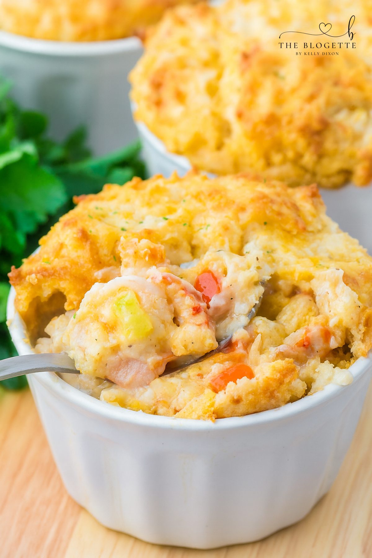 Seafood Pot Pie features a creamy seafood filling tucked beneath a flaky, golden Cheddar Bay Biscuit