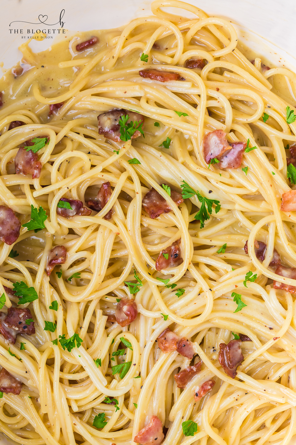 Spaghetti Carbonara is a classic pasta recipe made with eggs, cheese, black pepper, and crispy bacon or pancetta.